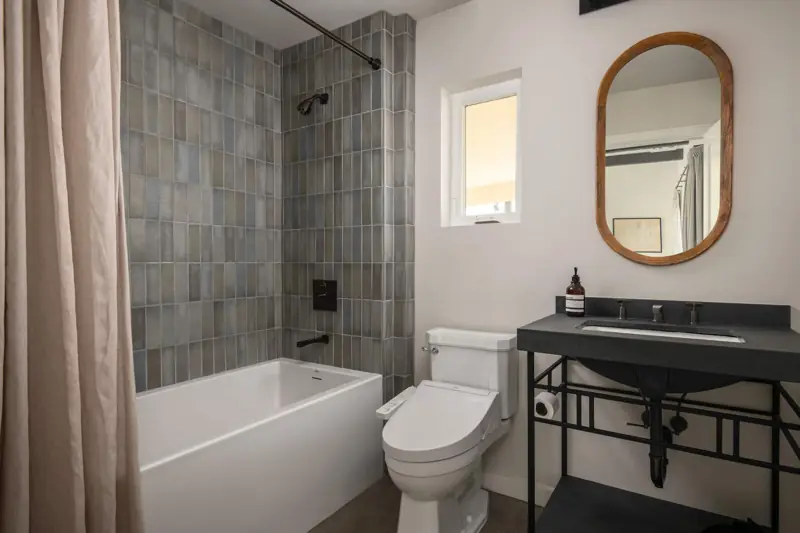 Full bathroom 2: The second bathroom off of the living room. Tub, shower and a Toto bidet.