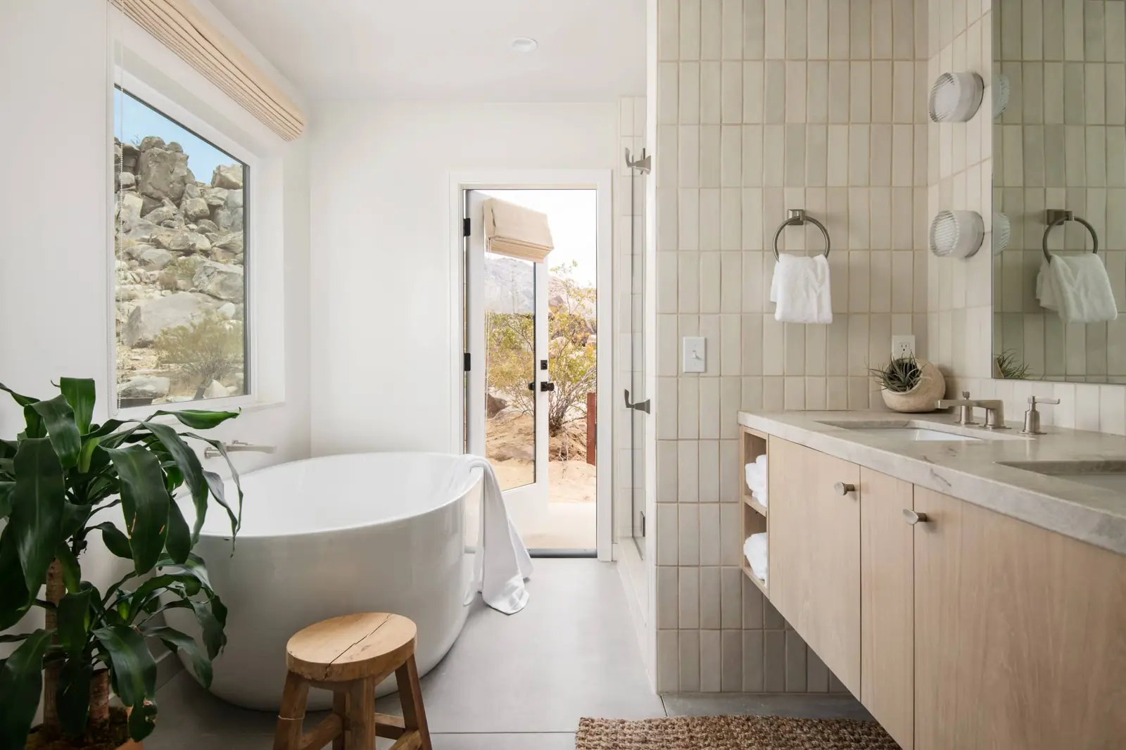 Primary bathroom with freestanding jetted tub and double vanity
