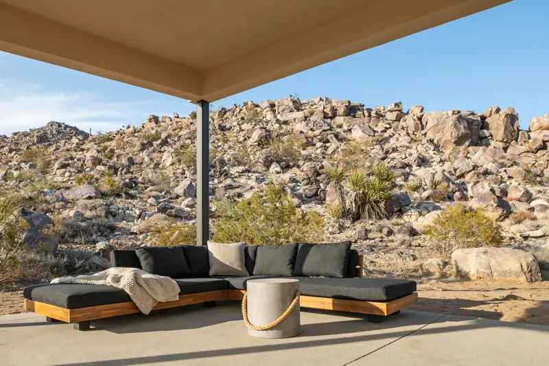Patio: Outdoor lounge sectional in the shaded patio.